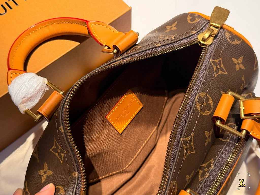 Louis Vuitton Keepall Front Pocket Barrel Bag — front