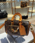 Louis Vuitton Keepall Front Pocket Barrel Bag — hero