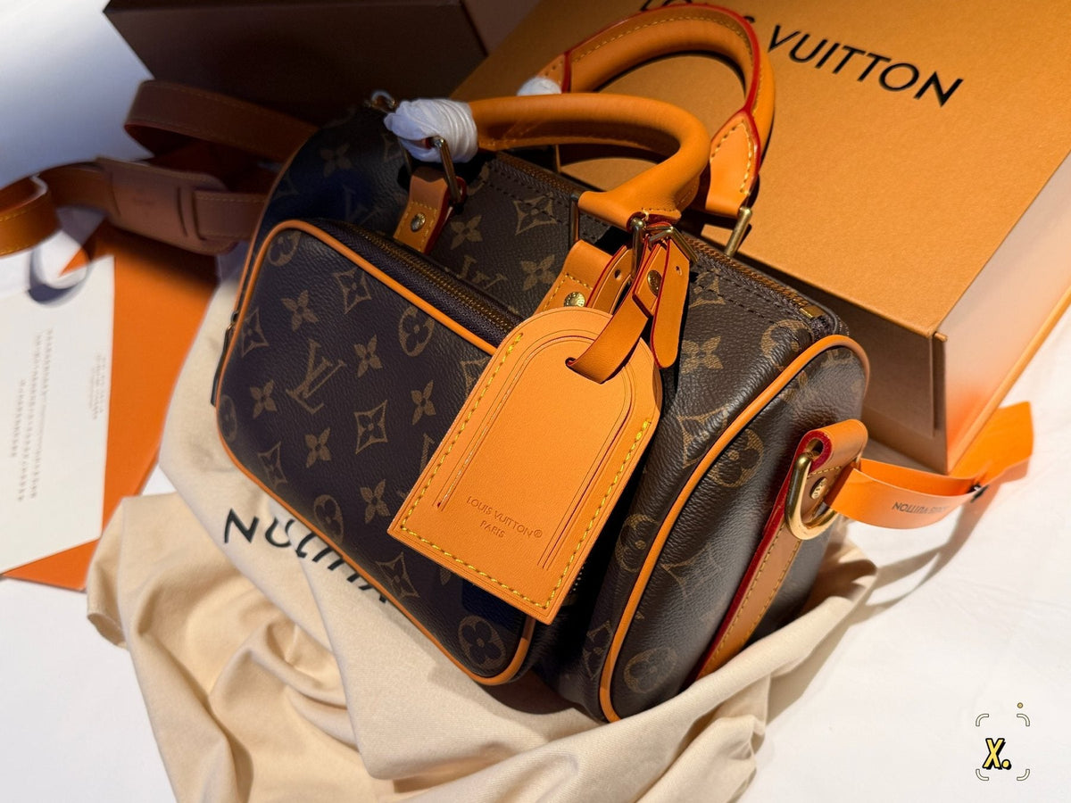Louis Vuitton Keepall Front Pocket Barrel Bag — side