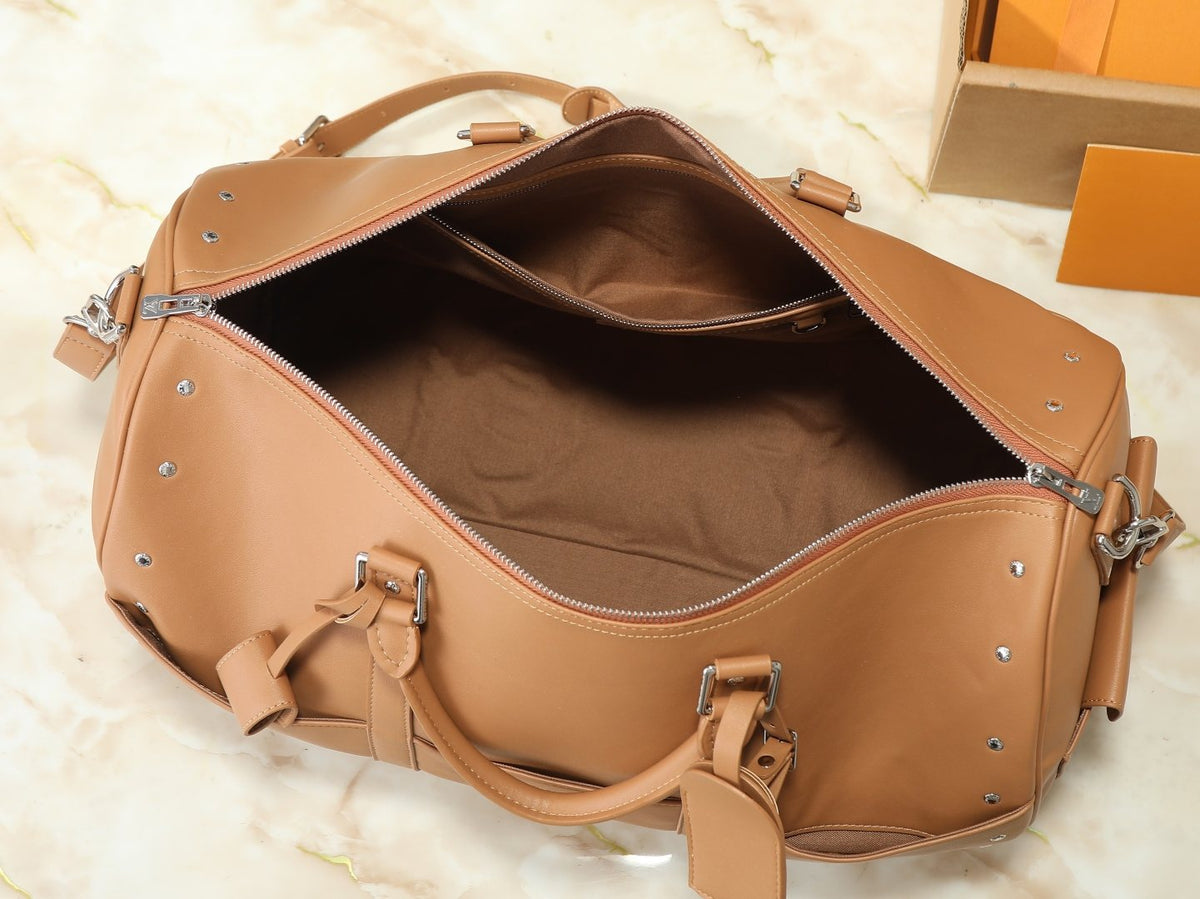 Louis Vuitton Keepall Studded Tan Duffel Bag — detail