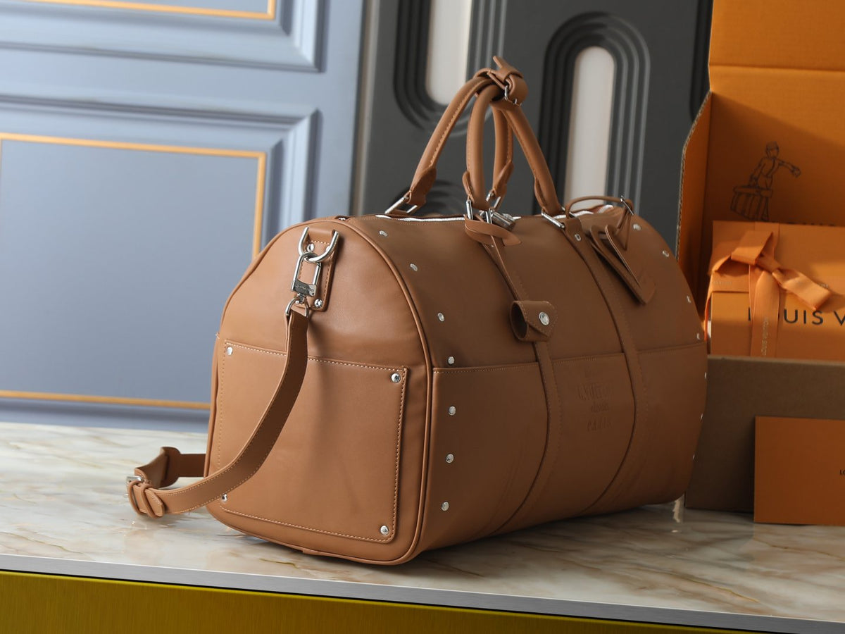 Louis Vuitton Keepall Studded Tan Duffel Bag — side