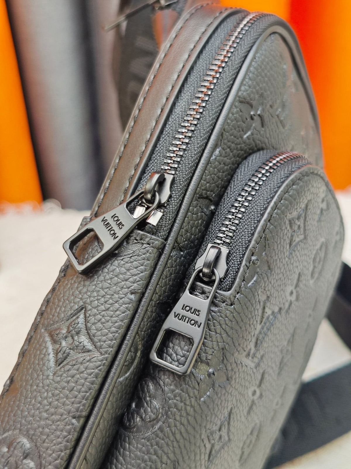 Louis Vuitton Avenue Sling Bag PM in Embossed Monogram — detail