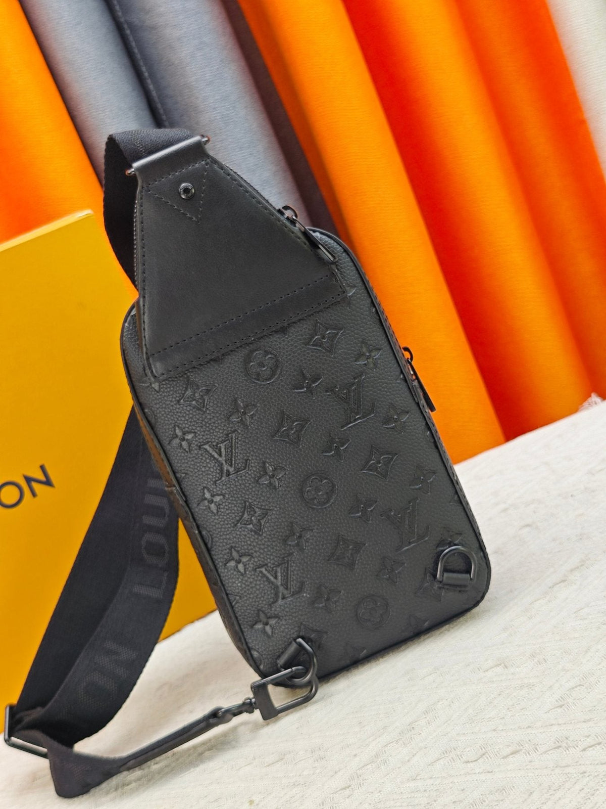 Louis Vuitton Avenue Sling Bag PM in Embossed Monogram — back