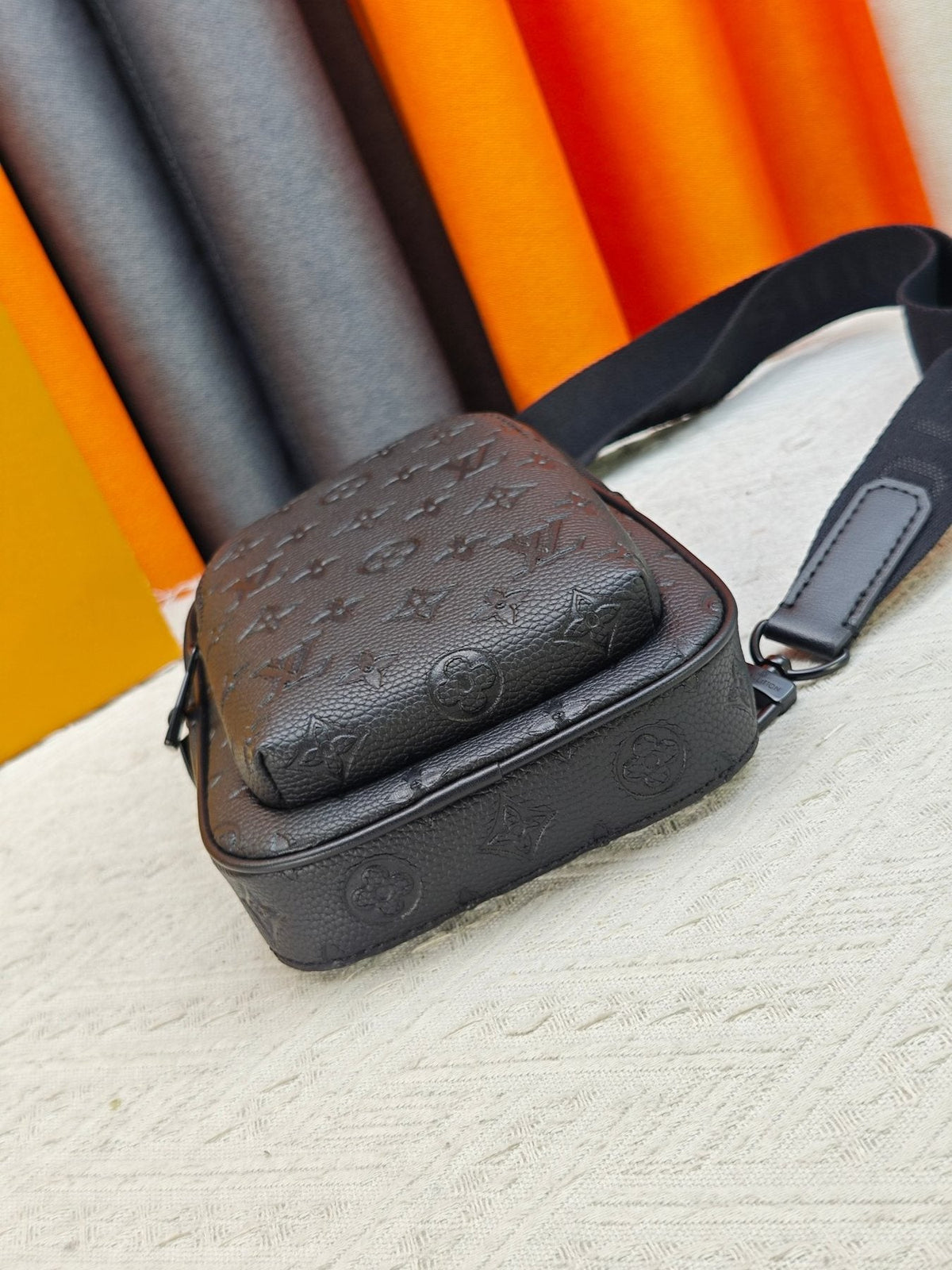 Louis Vuitton Avenue Sling Bag PM in Embossed Monogram — side