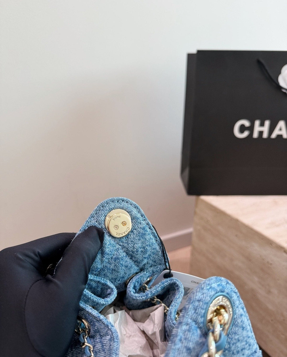 Chanel 25 Quilted Bucket Bag — detail