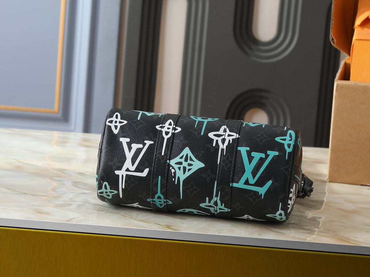 Louis Vuitton Keepall Bandoulière Duffel Bag — back