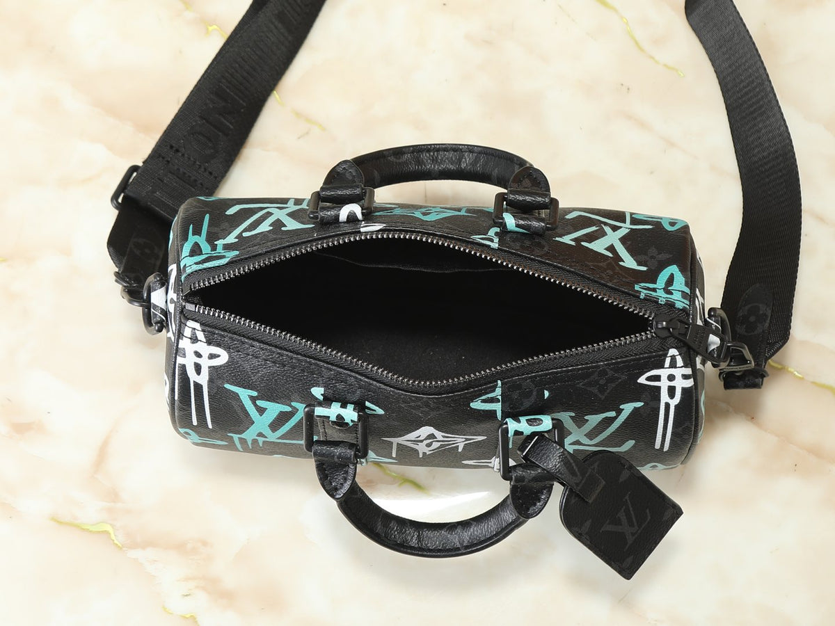 Louis Vuitton Keepall Bandoulière Duffel Bag — detail