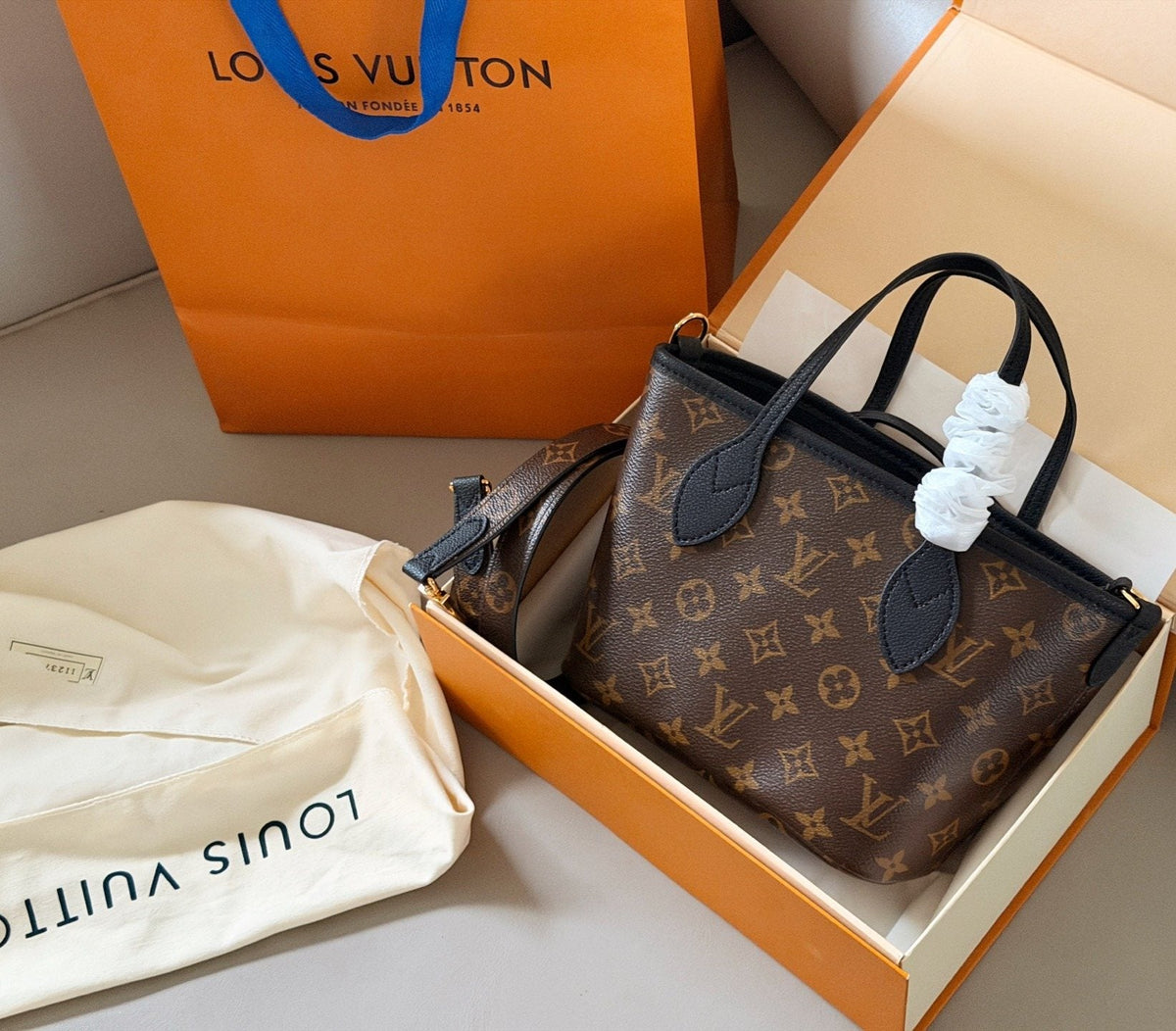 Louis Vuitton Neverfull BB Reversible Tote — front