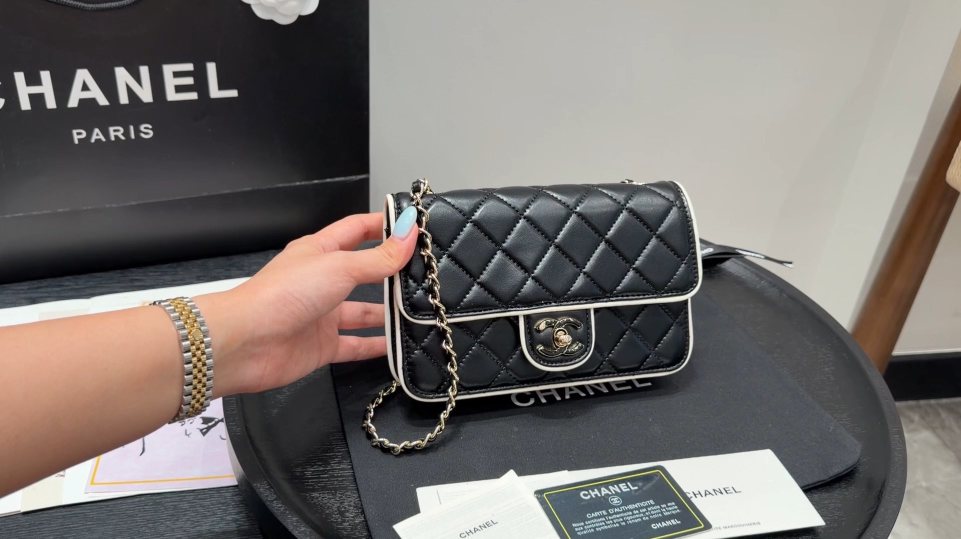 Chanel Quilted Wallet on Chain with Contrast Piping — front