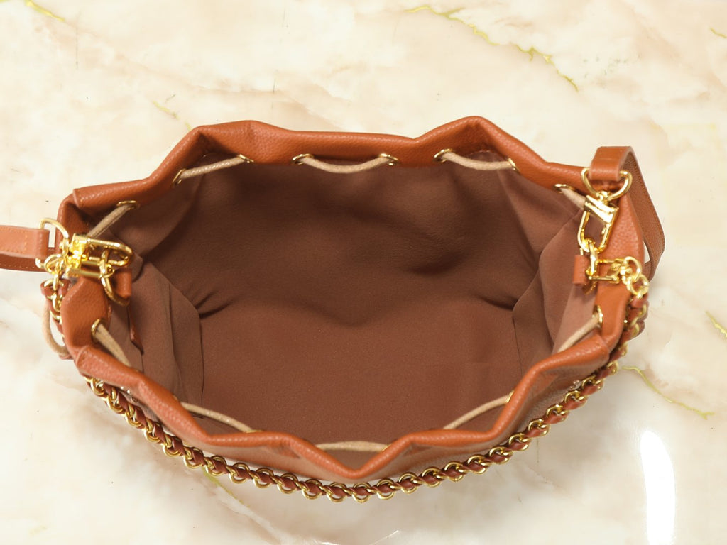 Louis Vuitton Noé Trunk Drawstring Bucket Bag — detail