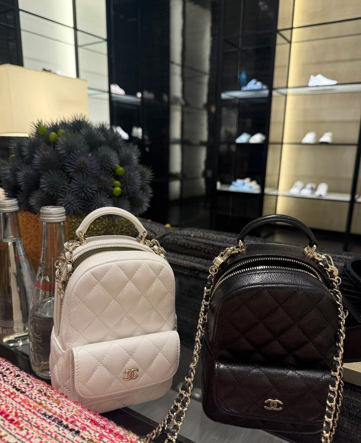 Chanel Quilted Top-Handle Backpack — comparison