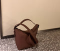 Longchamp Pebbled Leather Top-Handle Bucket Bag — hero