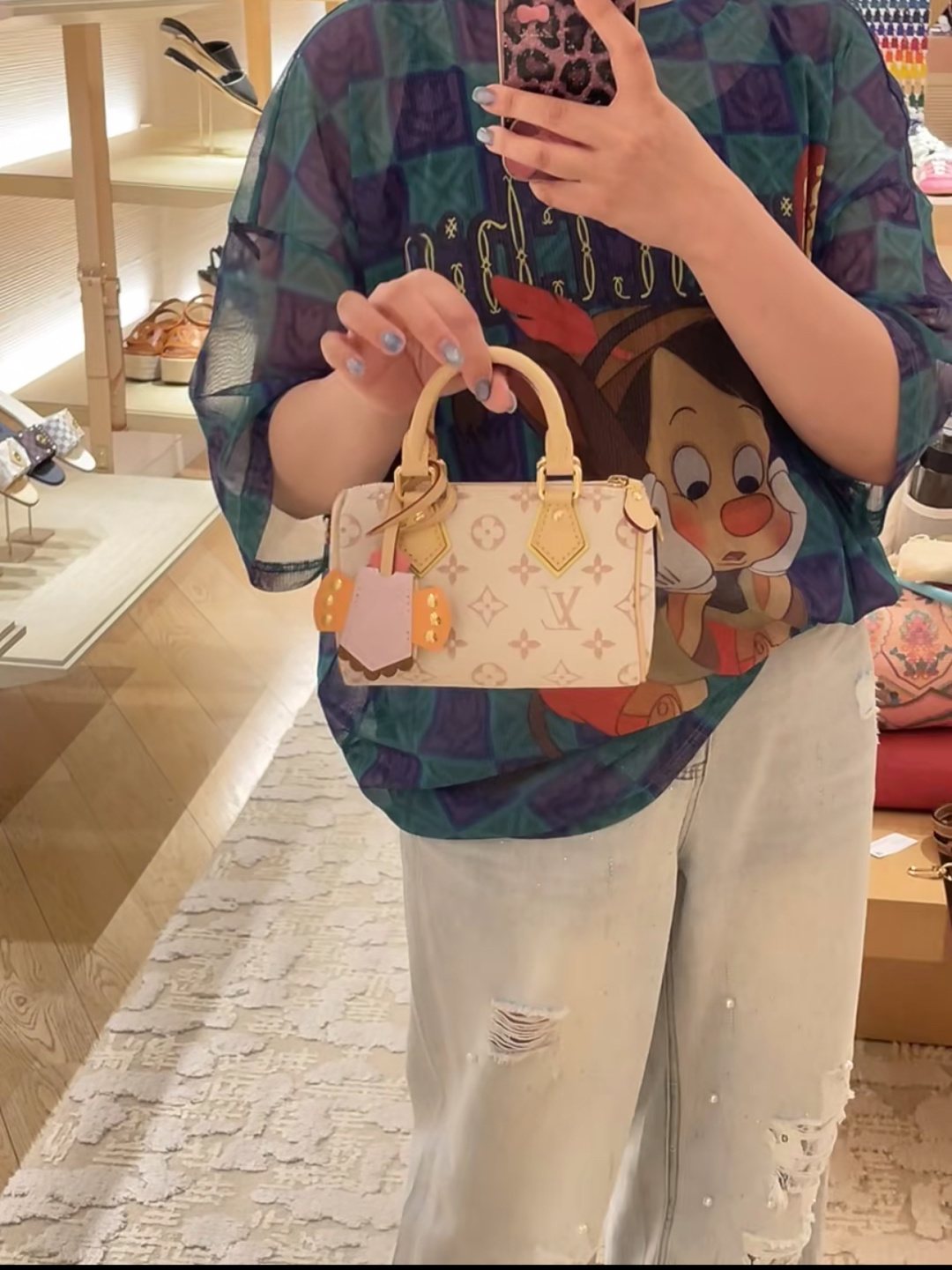 Louis Vuitton Nano Speedy Cream Monogram Bag — model