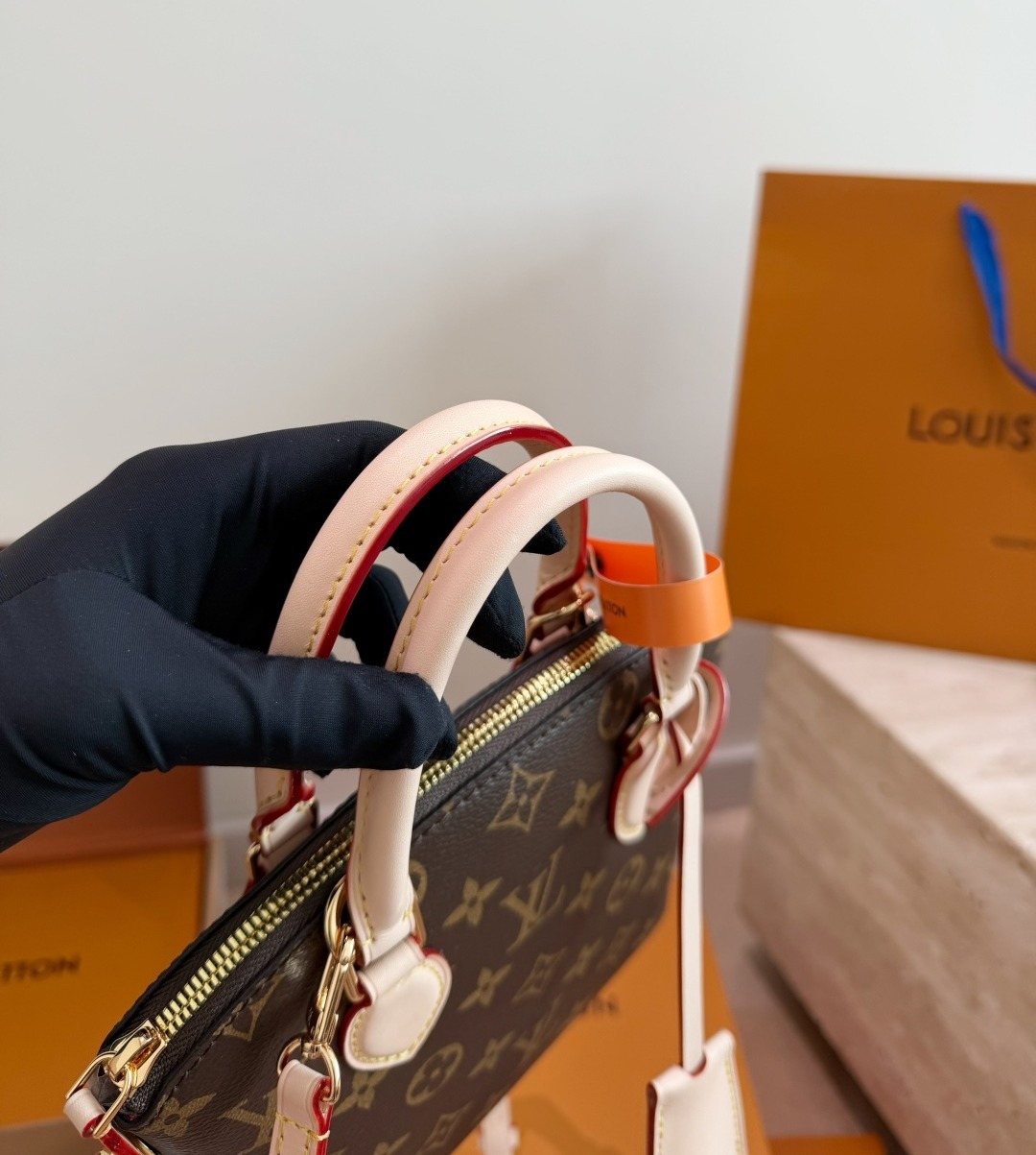 Louis Vuitton Lockit BB Monogram Top-Handle Bag — detail