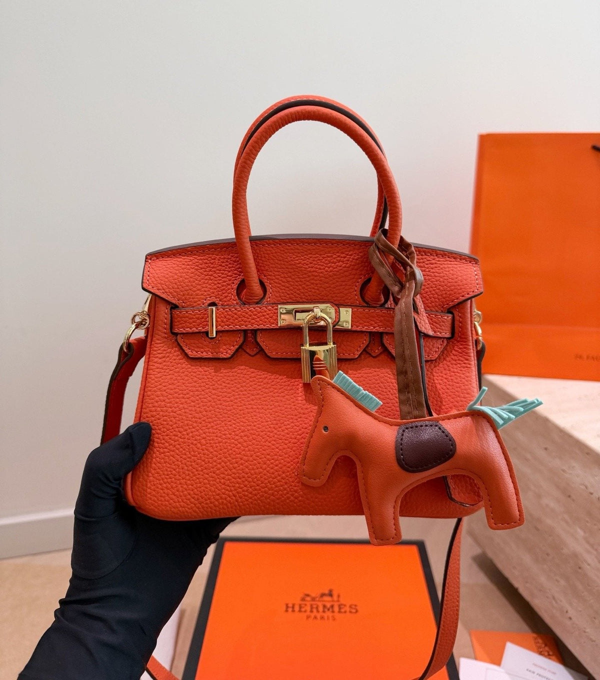 Hermès Grained Leather Top Handle Bag — model