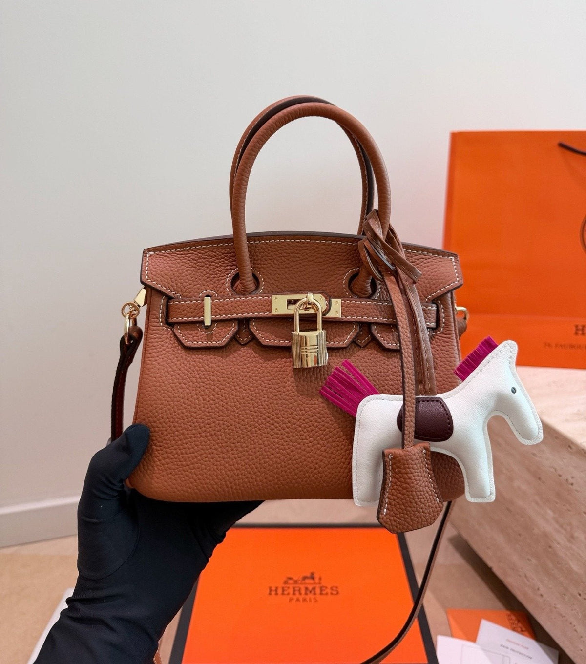 Hermès Grained Leather Top Handle Bag — model