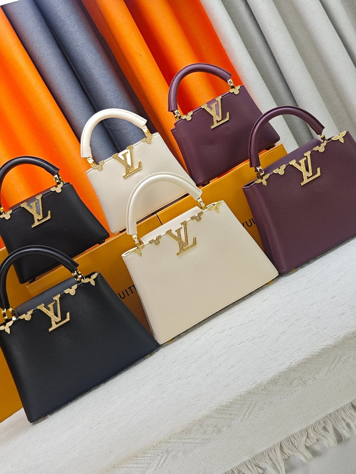 Louis Vuitton Capucines Flower Crown Top-Handle Bag — comparison