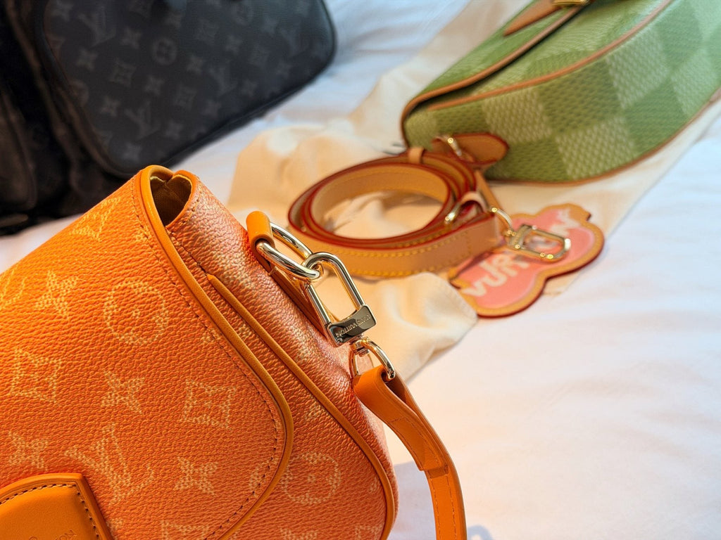 Louis Vuitton Curved-Flap Messenger Bag — detail