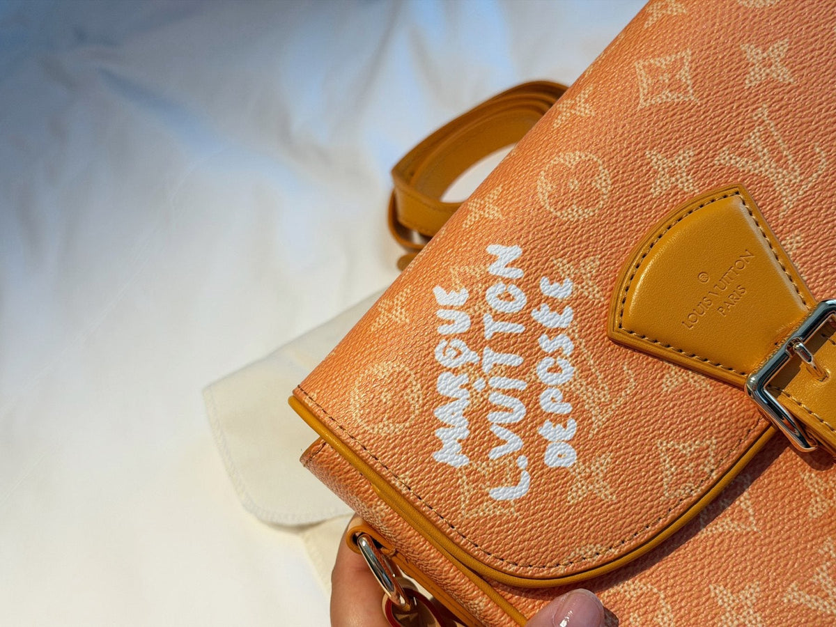 Louis Vuitton Curved-Flap Messenger Bag — detail