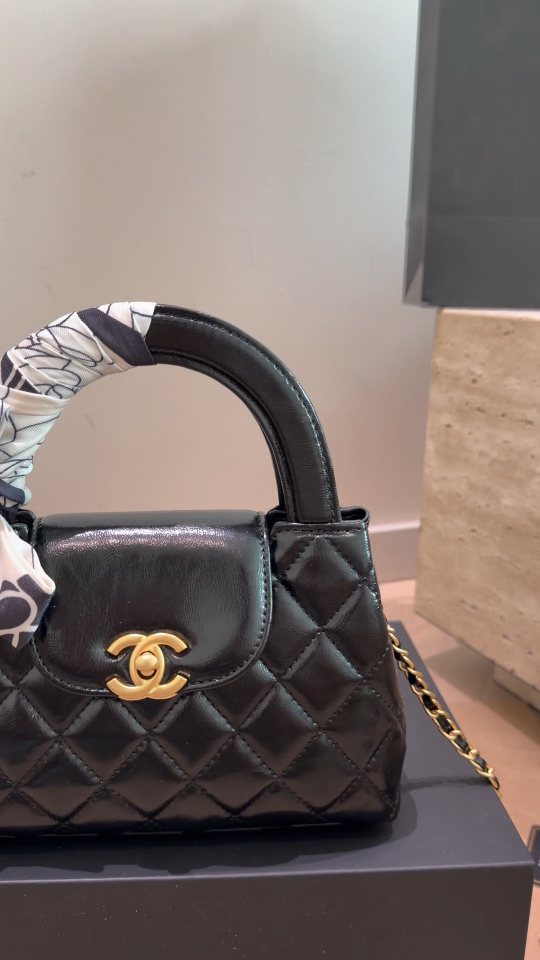Chanel Kelly Quilted Top-Handle Bag — detail