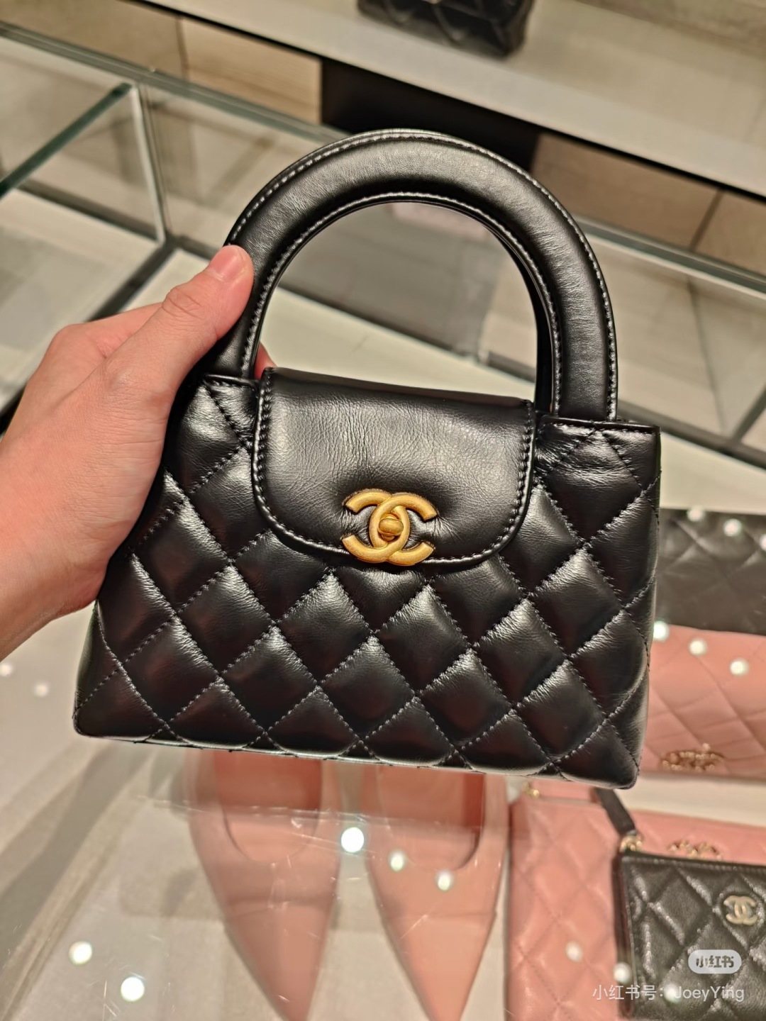 Chanel Kelly Quilted Top-Handle Bag — hero