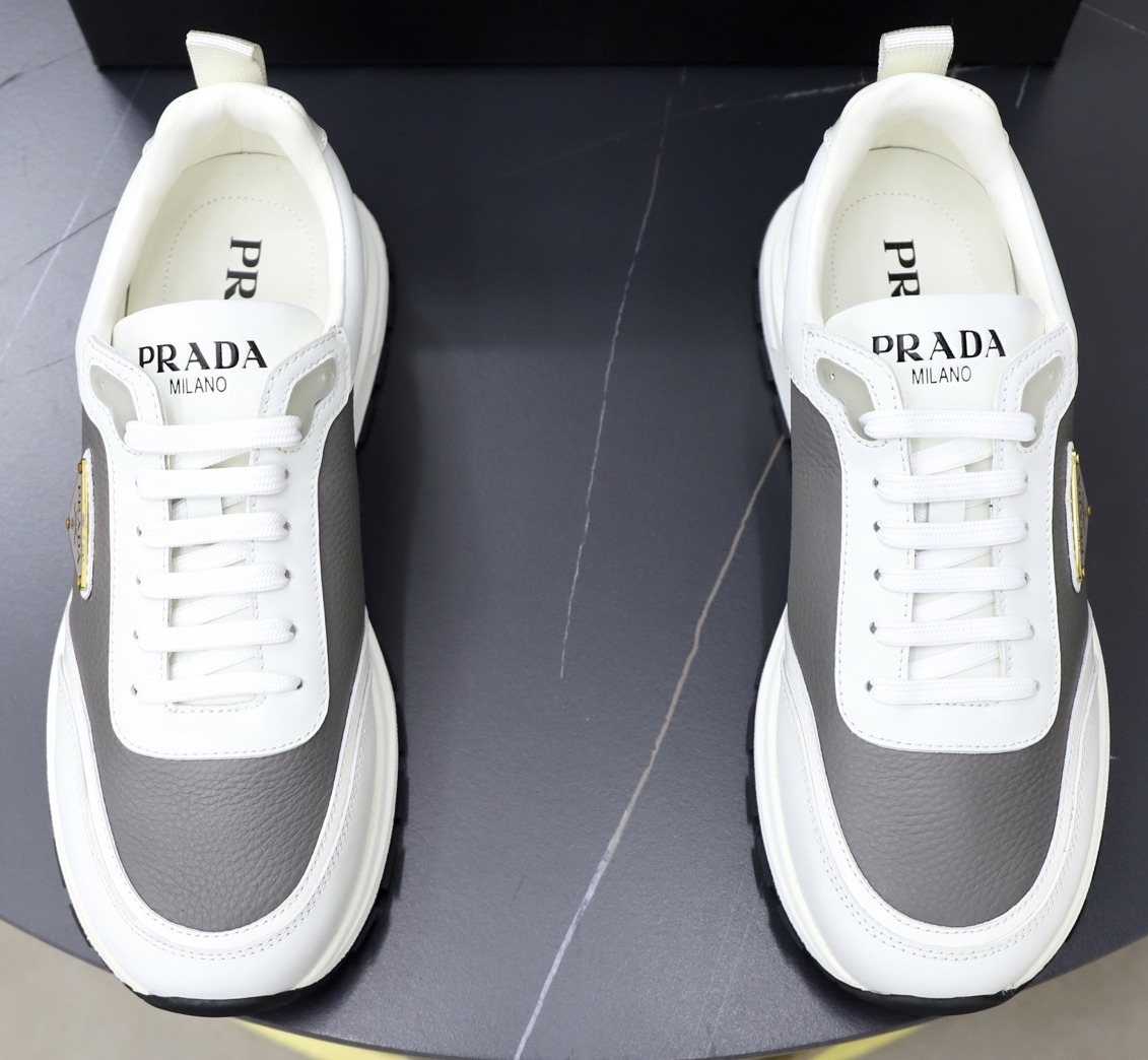 Prada Paneled Lace-Up Sneakers — front