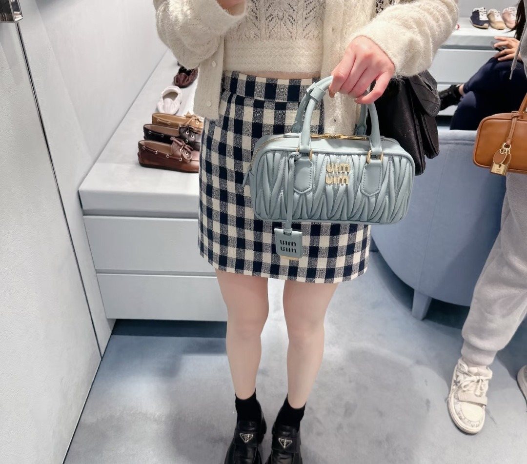 Miu Miu Gathered Bowling Top-Handle Bag — model
