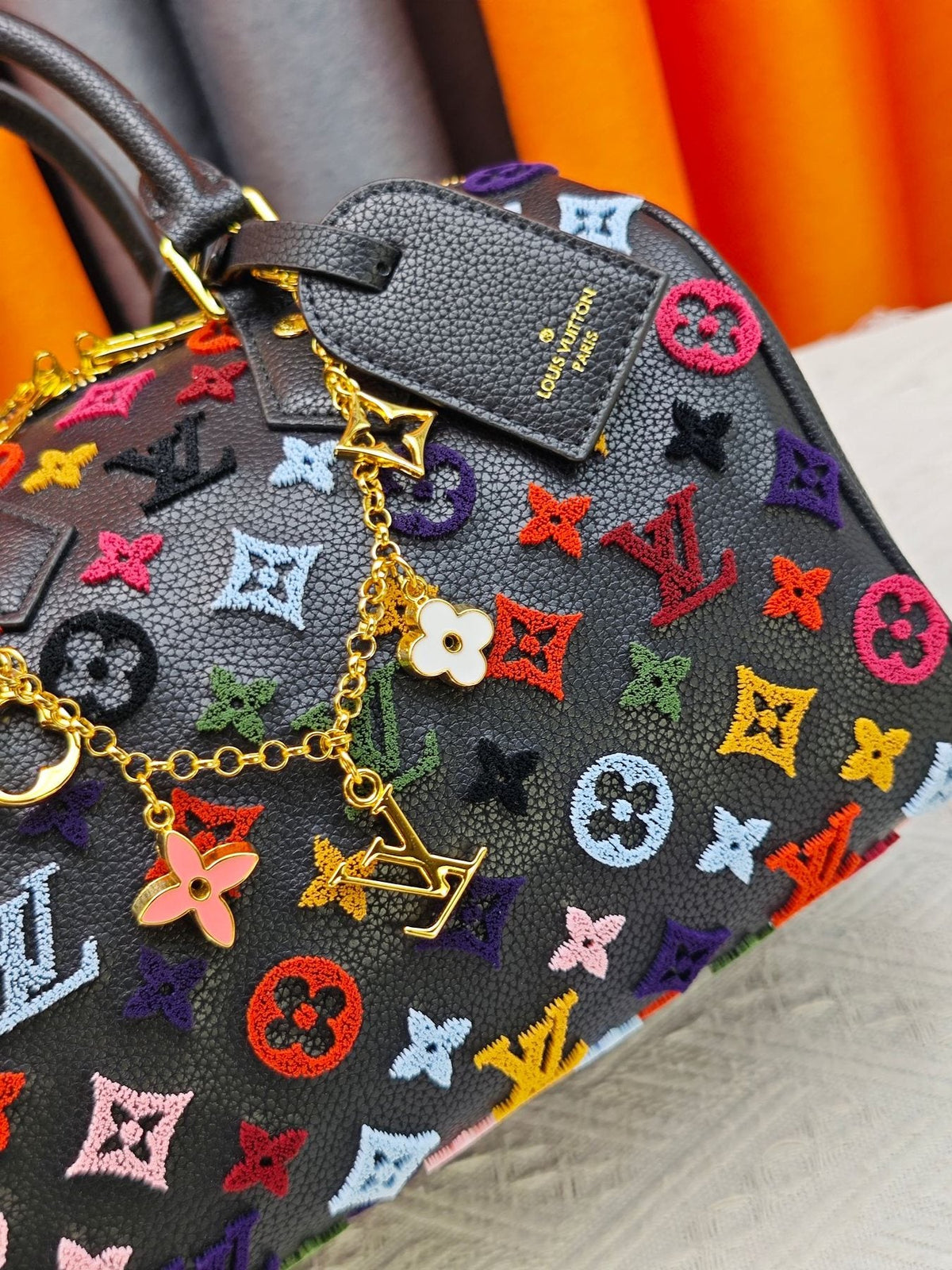 Louis Vuitton Speedy Bandoulière Printed Leather Bag — detail