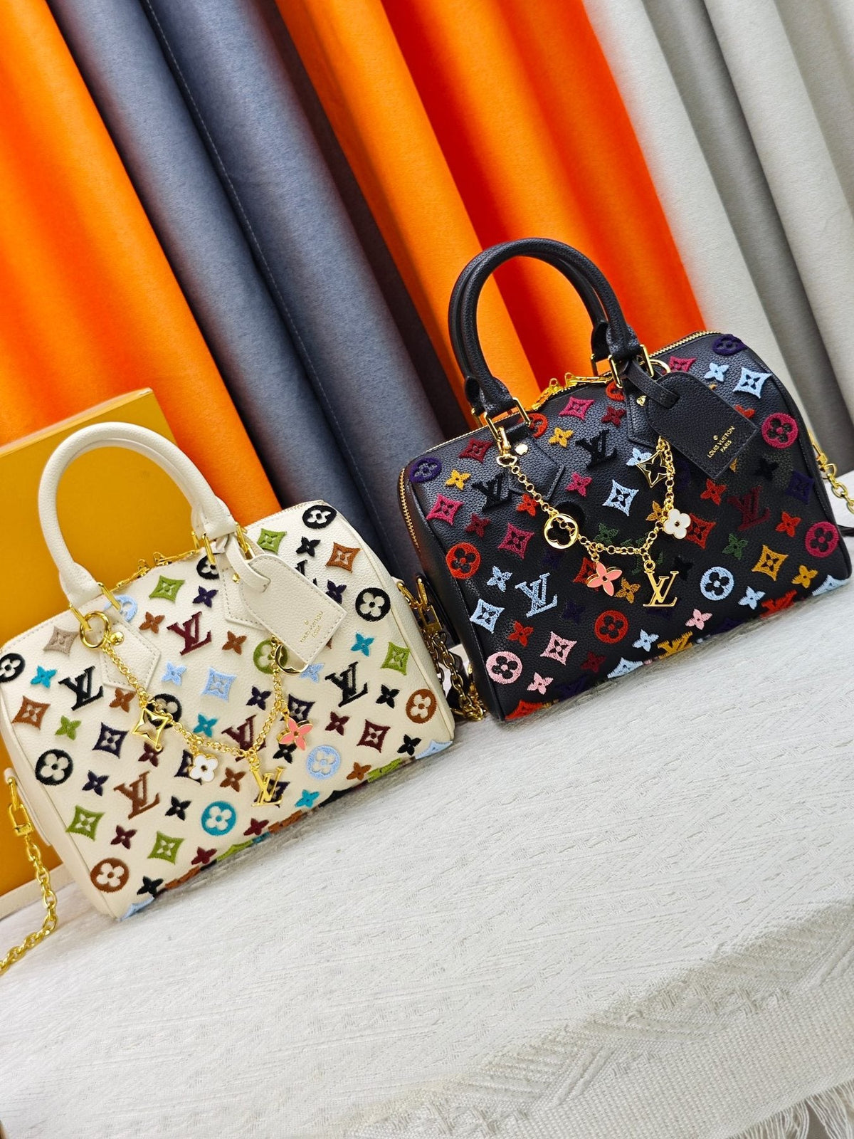 Louis Vuitton Speedy Bandoulière Printed Leather Bag — comparison