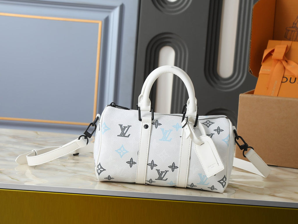 Louis Vuitton Keepall Bandoulière White Monogram Mini Duffel — hero