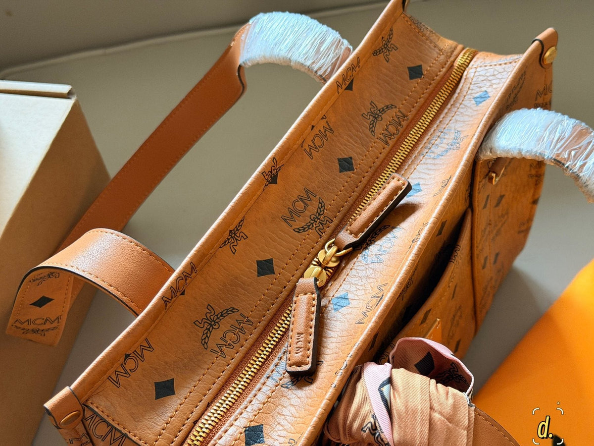 MCM Structured Monogram Tote with Front Plaque — detail