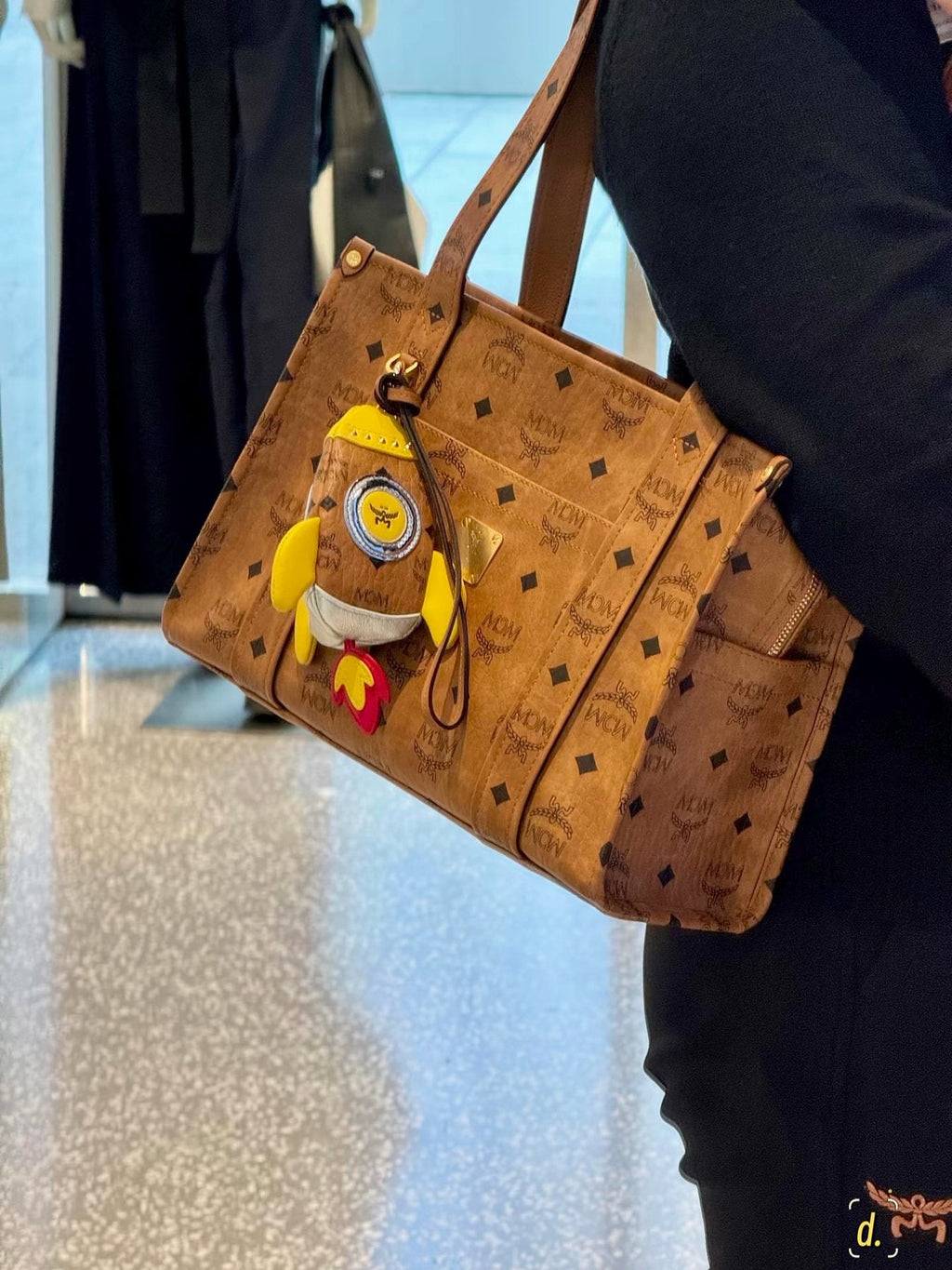 MCM Structured Monogram Tote with Front Plaque — model
