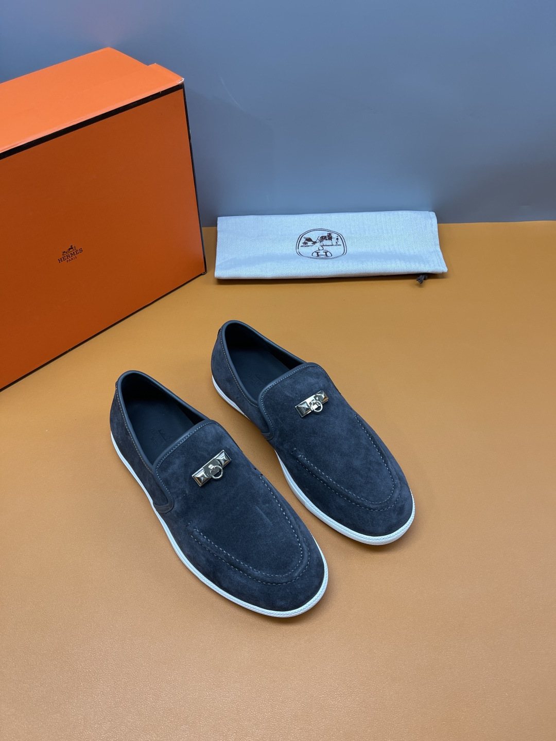 Hermès Mind Men's Buckle-Detail Loafers — front