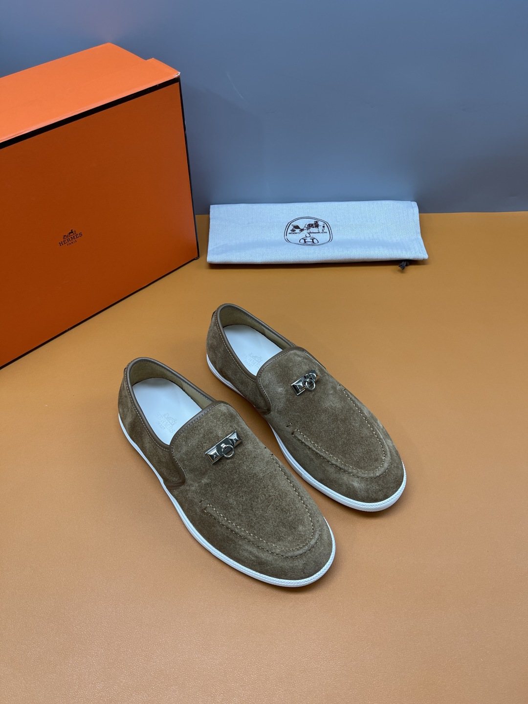 Hermès Mind Men's Buckle-Detail Loafers — front
