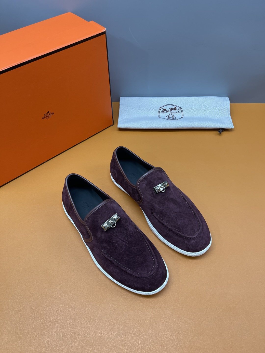 Hermès Mind Men's Buckle-Detail Loafers — front