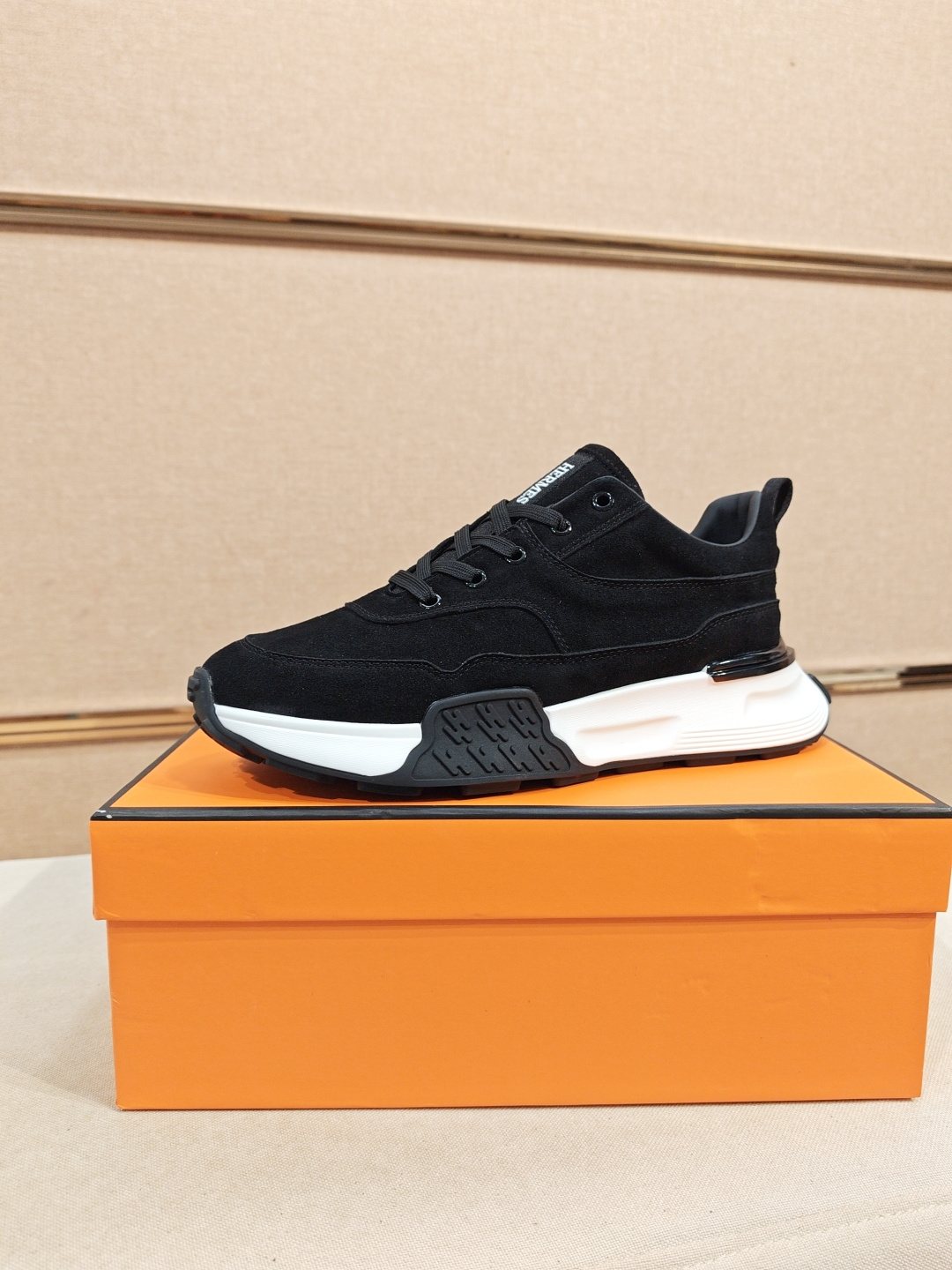 Hermès Lace-Up Sculpted-Sole Sneakers — front