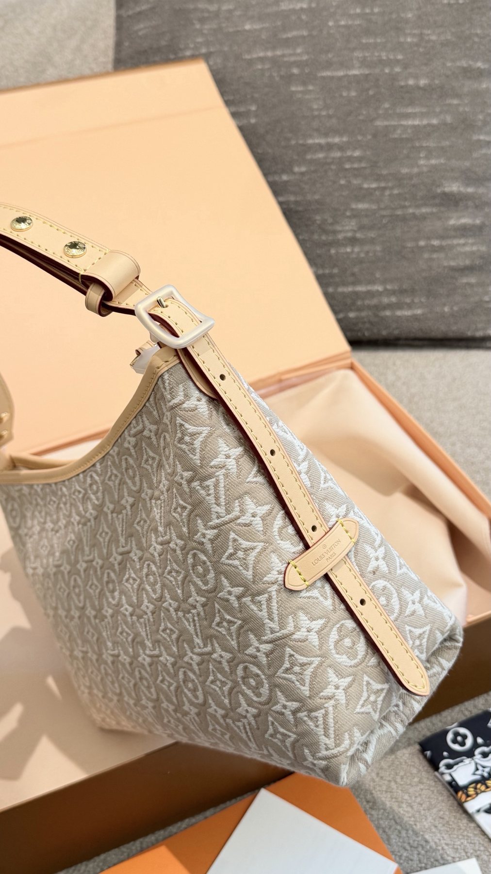 Louis Vuitton Carryall East West Raised Monogram Shoulder Bag — side