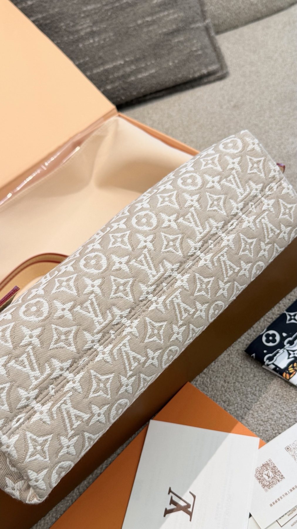Louis Vuitton Carryall East West Raised Monogram Shoulder Bag — detail