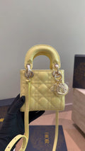 Dior Lady Dior Quilted Top-Handle Bag — hero