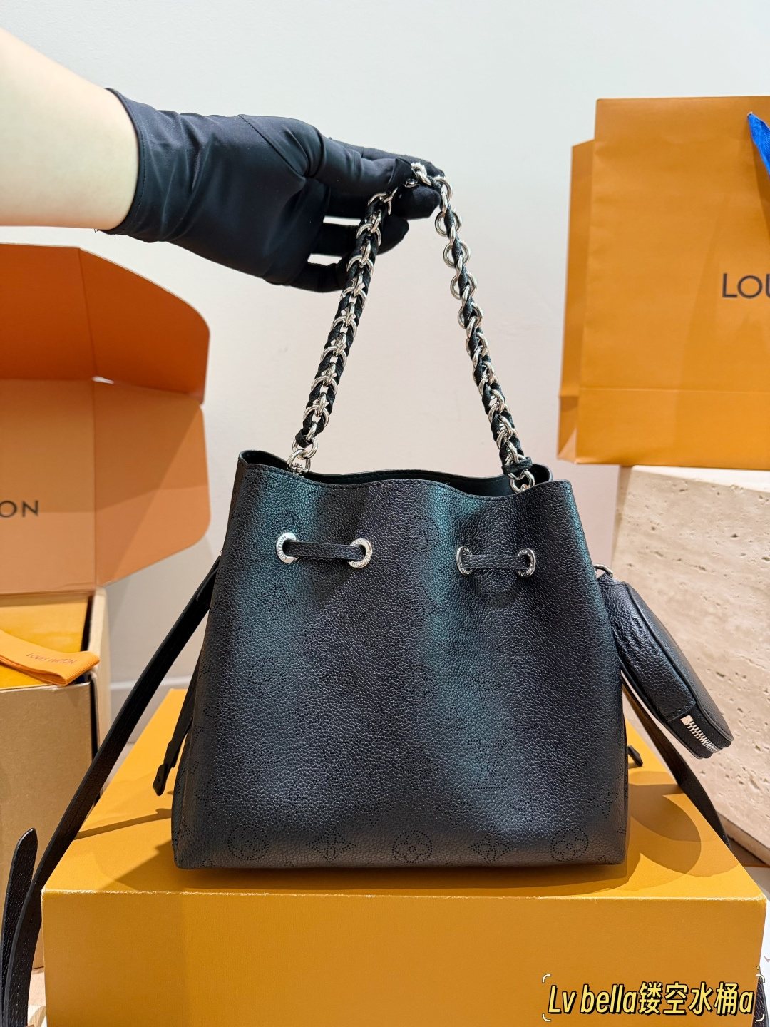 Louis Vuitton Bella Monogram Bucket Bag — model