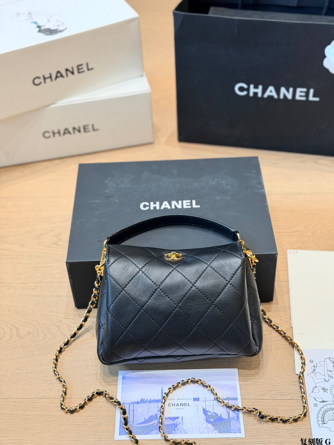 Chanel Rounded Diamond-Quilted Top-Handle Bag — hero