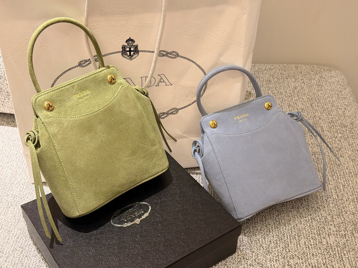 Prada Curved-Pocket Top-Handle Bag — comparison