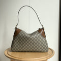 Gucci GG Emblem Monogram Shoulder Bag — hero