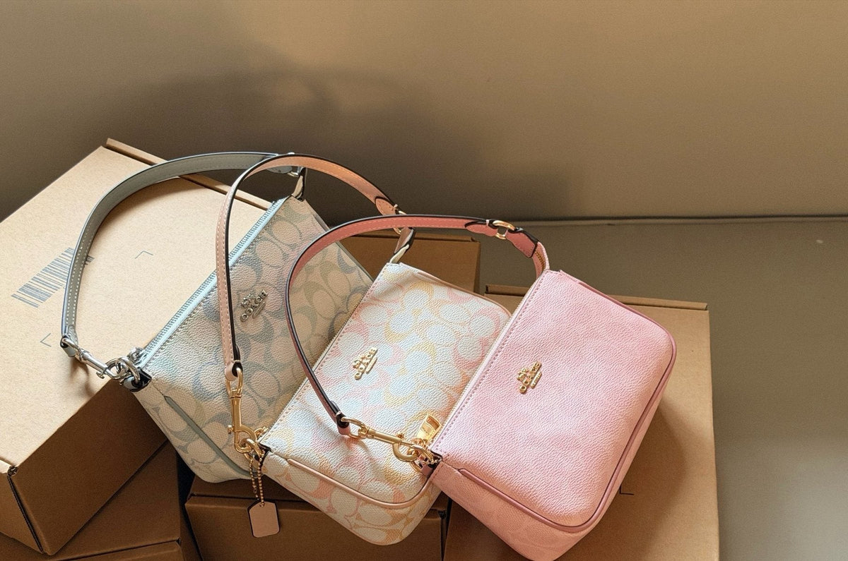 Coach Nolita Zip-Top Shoulder Bag — comparison