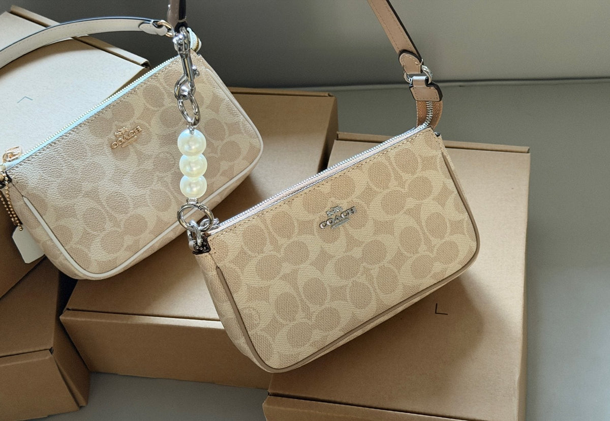 Coach Nolita Zip-Top Shoulder Bag — comparison