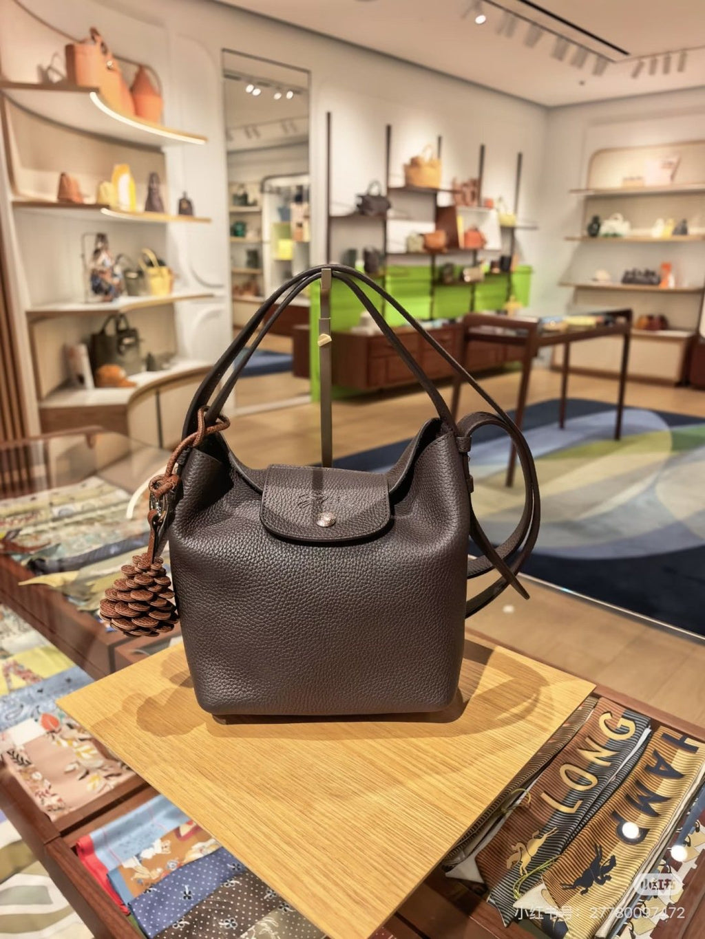 Longchamp Pebbled Bucket Bag with Rounded Snap Flap — hero