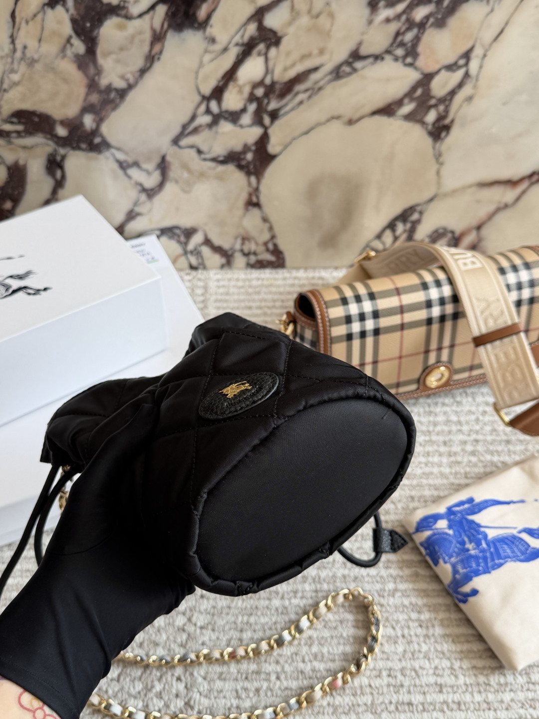 Black Quilted Chain-Strap Bucket Bag — front