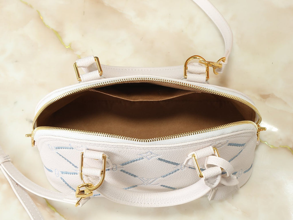 Louis Vuitton Alma BB Monogram Empreinte Couture Handbag — detail