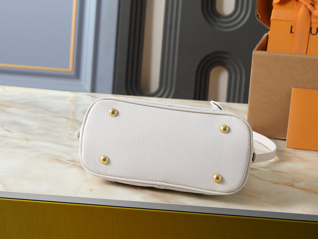 Louis Vuitton Alma BB Monogram Empreinte Couture Handbag — detail