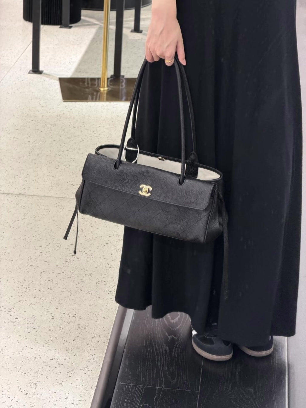 Chanel Quilted Baguette Shoulder Bag — model